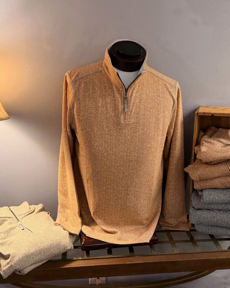 A herringbone quarter-zip on a mannequin
