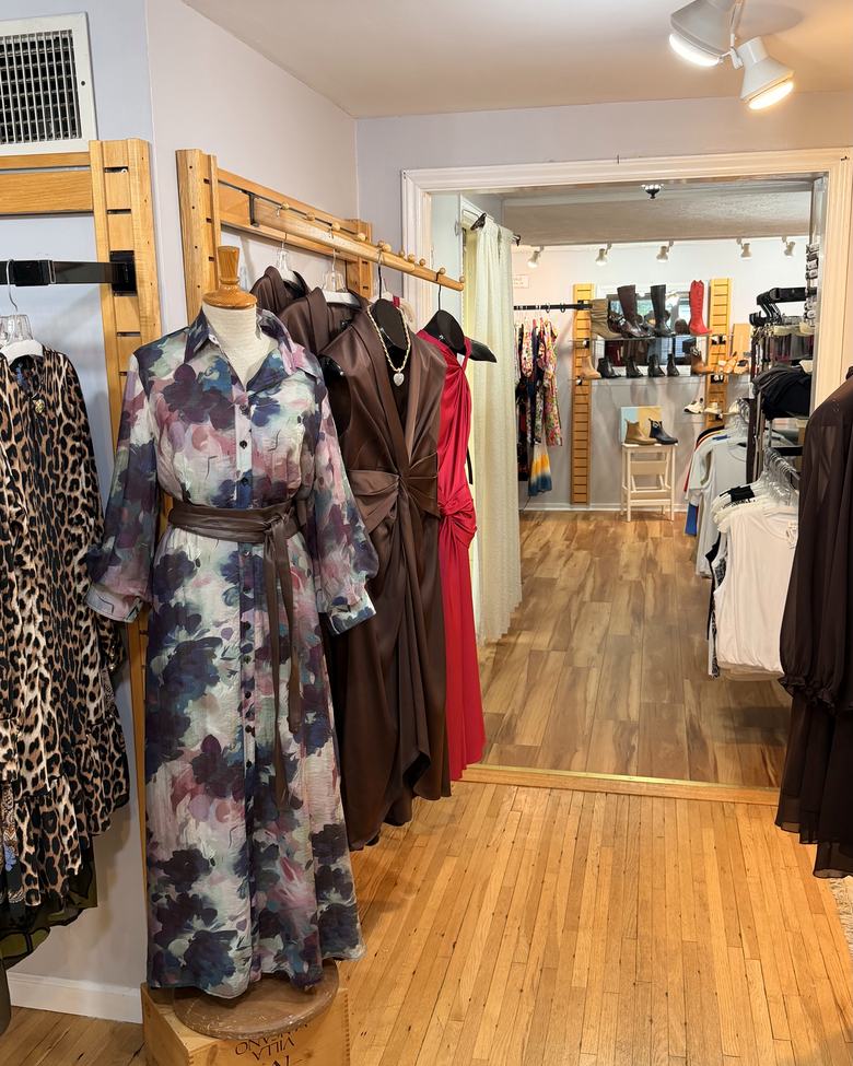 A floral shirt dress looking through to the shoe wall