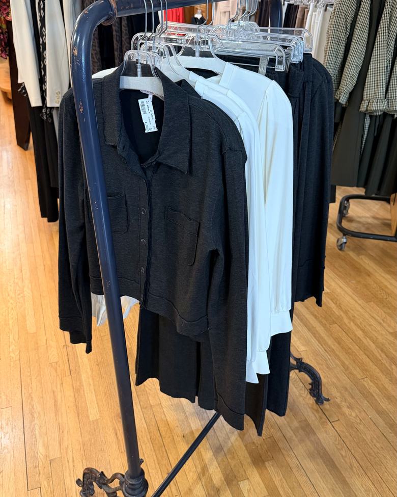 Charcoal and ivory separates on a rack